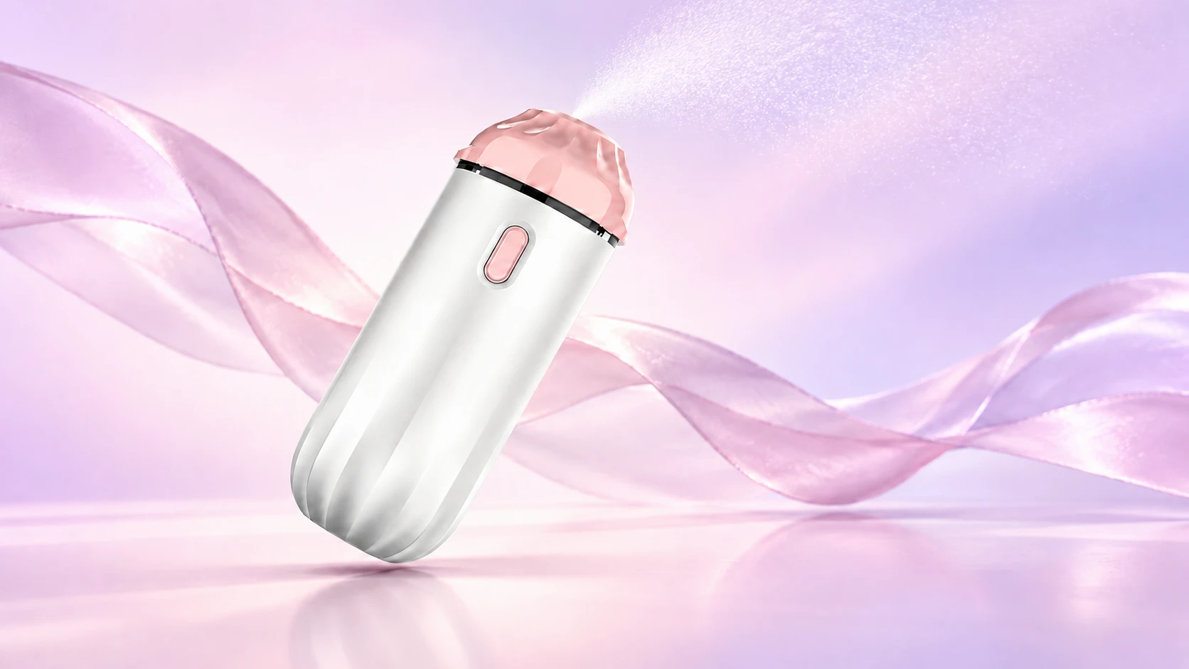 Mini pocket mist sprayer tilted while releasing a fine natural mist